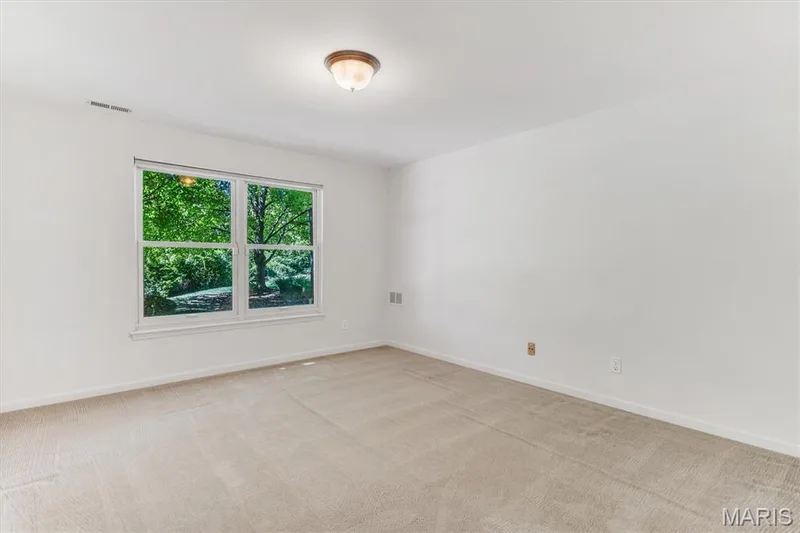 THIRD bedroom has peaceful tree view. — 18 Country Bluff Court, St Charles, MO 63301