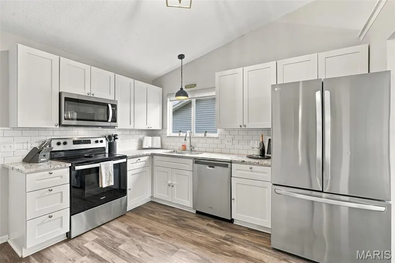 Kitchen with stainless appliances — 6 S Perry Circle, O'Fallon, MO 63366