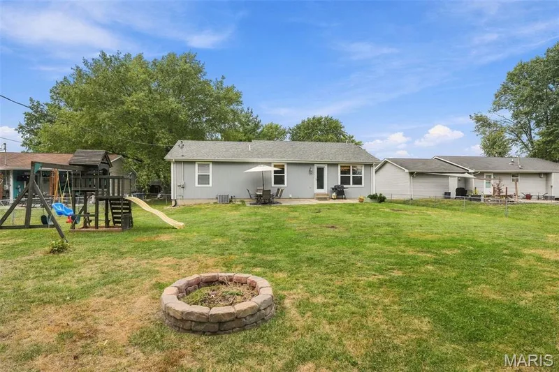 Backyard w/fire pit — 6 S Perry Circle, O'Fallon, MO 63366