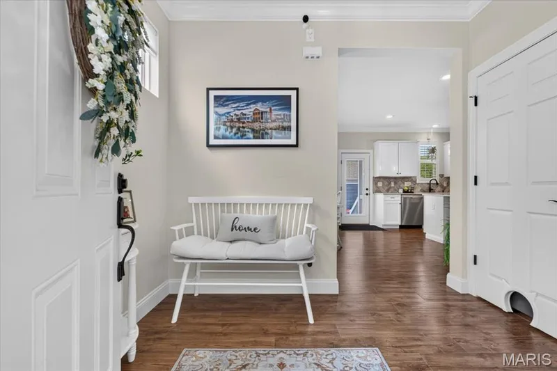 Wood-finish flooring throughout the entryway — 3708 Broad Street, St Charles, MO 63301