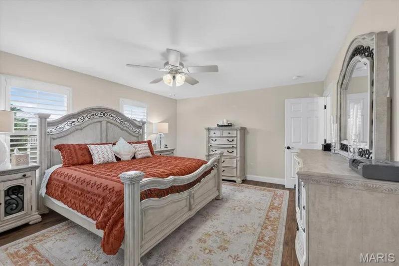 Wood-finish flooring with a ceiling fan light fixture — 3708 Broad Street, St Charles, MO 63301