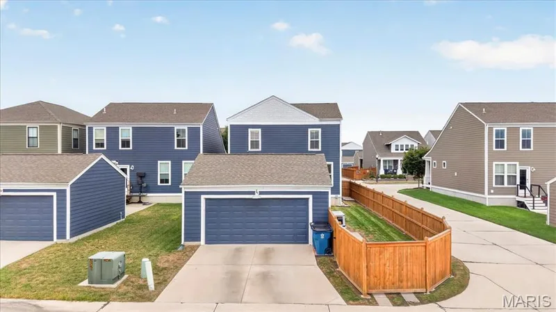 Two-story residence with blue siding and white trim — 3708 Broad Street, St Charles, MO 63301