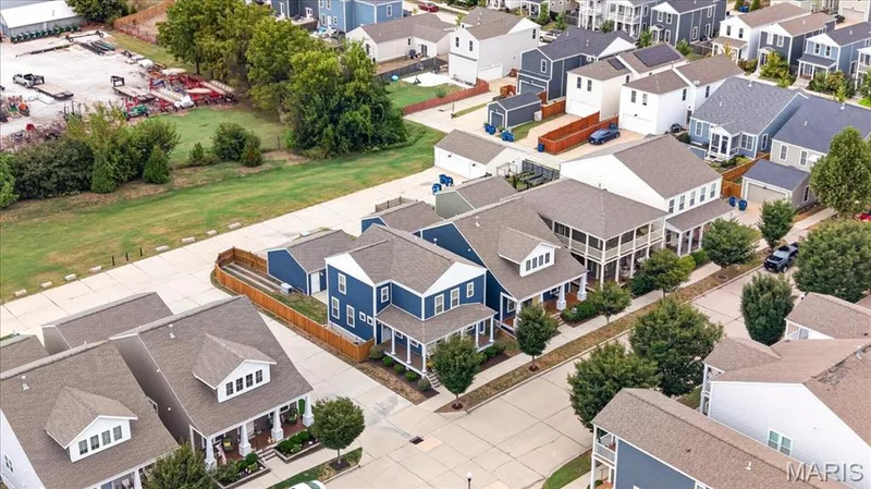 Community featuring varied architectural styles and established street trees — 3708 Broad Street, St Charles, MO 63301