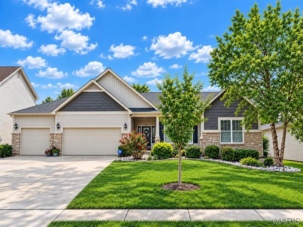 Stone and siding exterior with dark shake accents — 1229 Cashmere Lane, St Peters, MO 63376