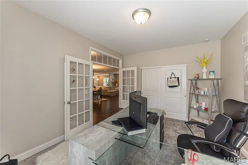 French doors with transom window, recessed lighting, sliding closet doors, and carpeted flooring — 1229 Cashmere Lane, St Peters, MO 63376