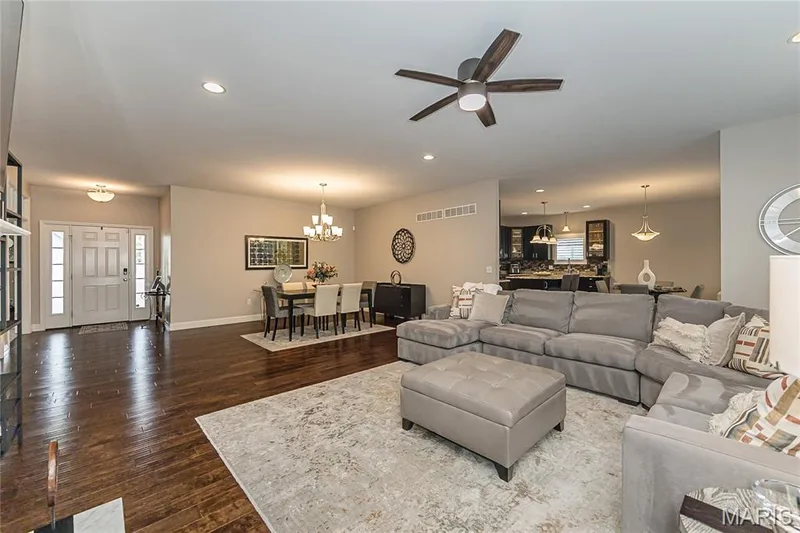 Hardwood flooring throughout, recessed lighting, and a contemporary ceiling fan — 1229 Cashmere Lane, St Peters, MO 63376