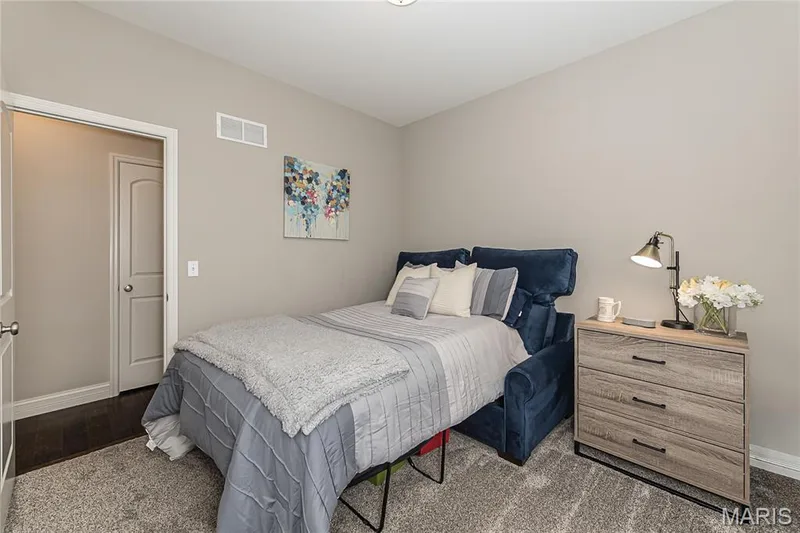 Neutral-toned walls with ceiling-mounted lighting — 1229 Cashmere Lane, St Peters, MO 63376