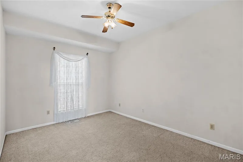 Ceiling fan with wood-finish blades — 104 Wolf Trail Court, Defiance, MO 63341