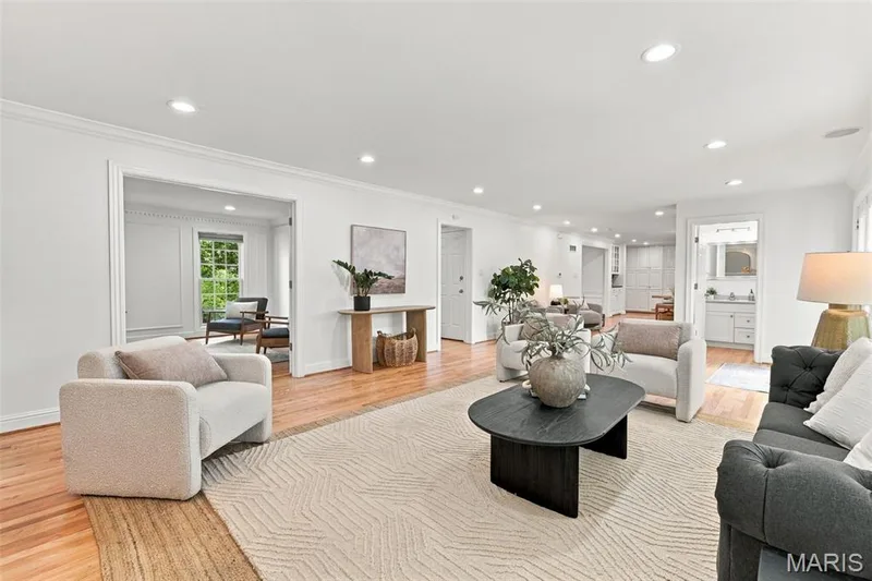 Hardwood flooring, recessed lighting, crown molding, and a wide entryway — 2785 Sun Meadow Drive, Wildwood, MO 63005
