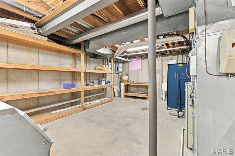 Concrete flooring and walls with exposed ceiling joists — 2785 Sun Meadow Drive, Wildwood, MO 63005