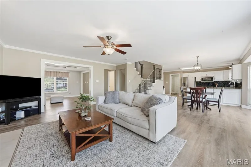 Hearth Room with gas fireplace adjoins Breakfast Area and Living Room. — 386 Beckley Place, St Charles, MO 63304