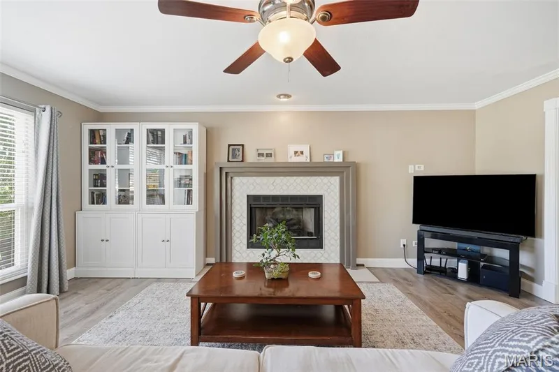 Hearth Room with gas fireplace adjoins Breakfast Area and Living Room. — 386 Beckley Place, St Charles, MO 63304