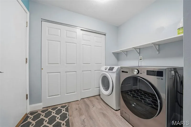 Mudroom with Laundry off Kitchen and has door to garage. — 386 Beckley Place, St Charles, MO 63304