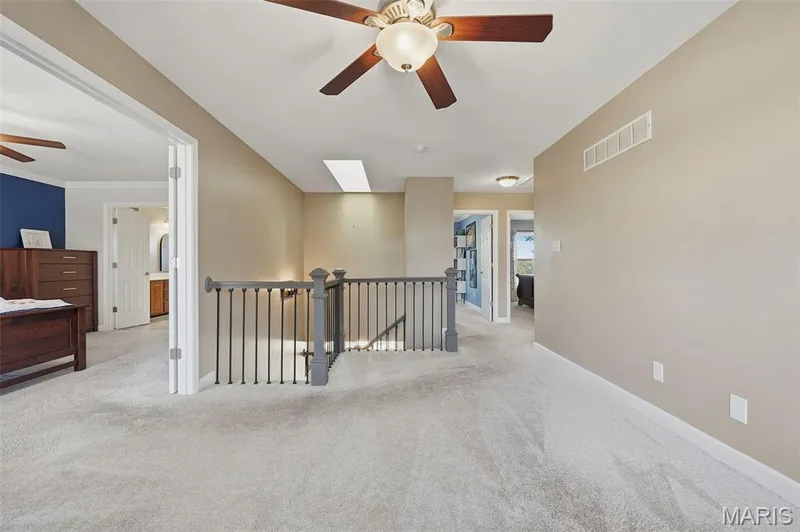 Upstairs Family Room adjoins Primary Suite, secondary bedrooms 2-4, and Hall Bath. — 386 Beckley Place, St Charles, MO 63304