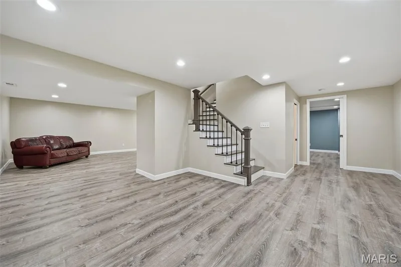 Lower-Level Rec Room adjoins, staircase, LL Bath, Gym, and TV/Media area. — 386 Beckley Place, St Charles, MO 63304