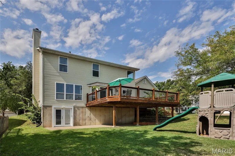 Lower-Level walkout to patio, covered patio, and backyard. — 386 Beckley Place, St Charles, MO 63304