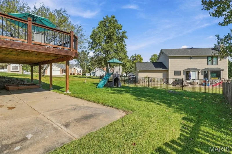 Lower-Level walkout to patio, covered patio, and backyard. — 386 Beckley Place, St Charles, MO 63304