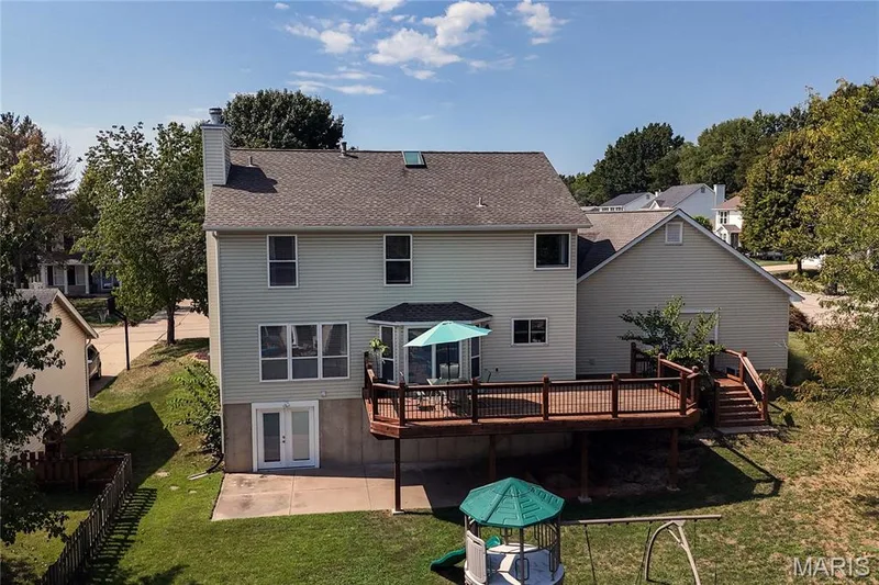 Rear deck overlooking the backyard. — 386 Beckley Place, St Charles, MO 63304