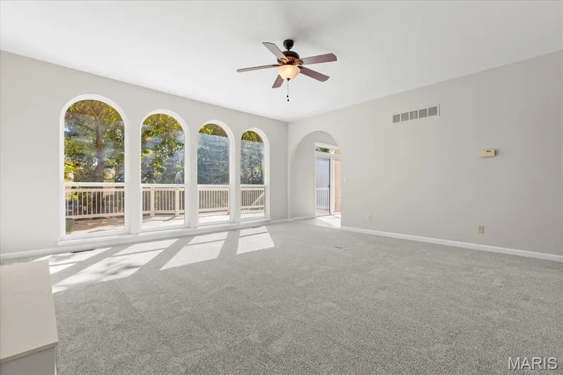 Den with a lot of natural light — 16 Regatta Bay Court, Lake St. Louis, MO 63367