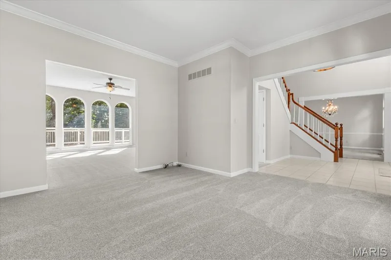 Den - Looking into the living room and Foyer — 16 Regatta Bay Court, Lake St. Louis, MO 63367