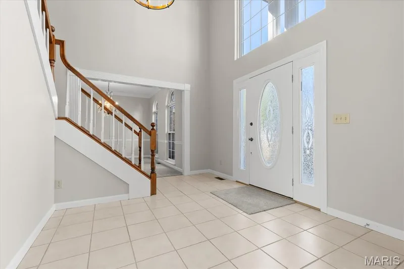 Large open Foyer with 22' ceilings — 16 Regatta Bay Court, Lake St. Louis, MO 63367