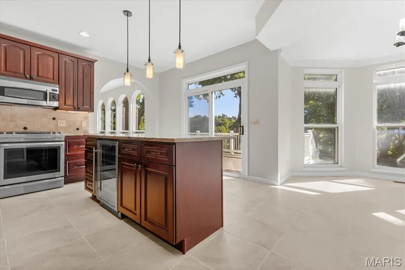 Kitchen ALSO has tons of natural light and views of the lake — 16 Regatta Bay Court, Lake St. Louis, MO 63367