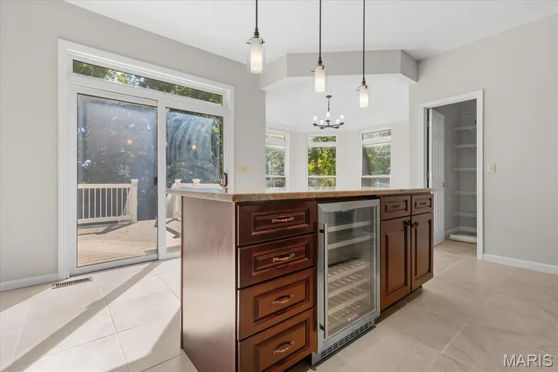 Wine refrigerator in the center island — 16 Regatta Bay Court, Lake St. Louis, MO 63367