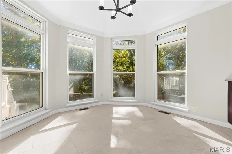 Breakfast eating area with natural light and YES views of the lake — 16 Regatta Bay Court, Lake St. Louis, MO 63367
