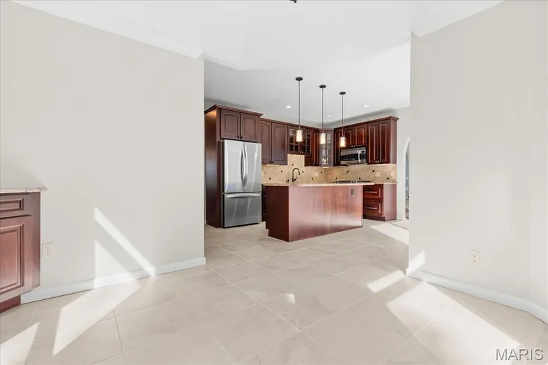 View from breakfast area back to kitchen — 16 Regatta Bay Court, Lake St. Louis, MO 63367