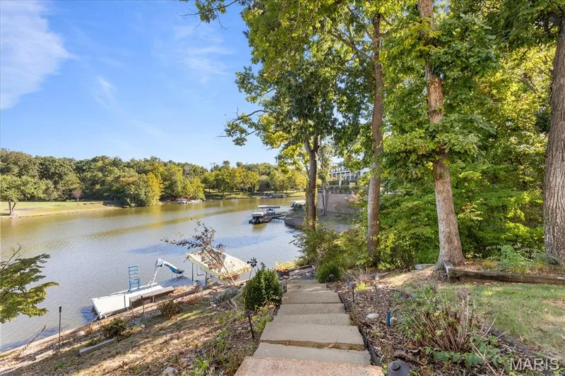 Stone walkway to the lake and boat dock — 16 Regatta Bay Court, Lake St. Louis, MO 63367