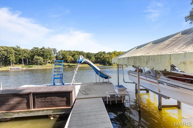 Boat dock with stairs, slide and boat lift. Boat is optional — 16 Regatta Bay Court, Lake St. Louis, MO 63367