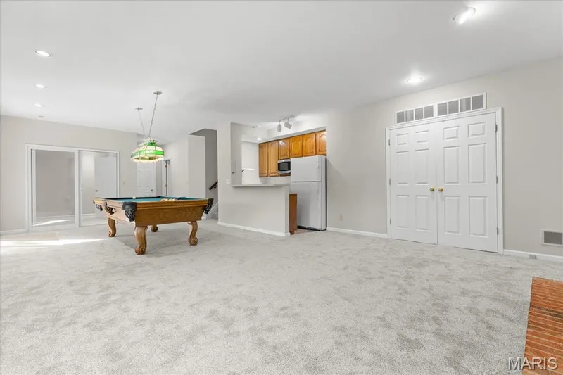 Recreation room also has full wet bar and access to a lot of storage — 16 Regatta Bay Court, Lake St. Louis, MO 63367