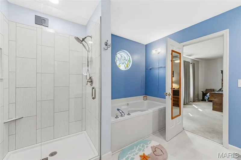 Updated master bathroom with tile shower and soaker tub. — 559 John Meyer Drive, St Charles, MO 63304