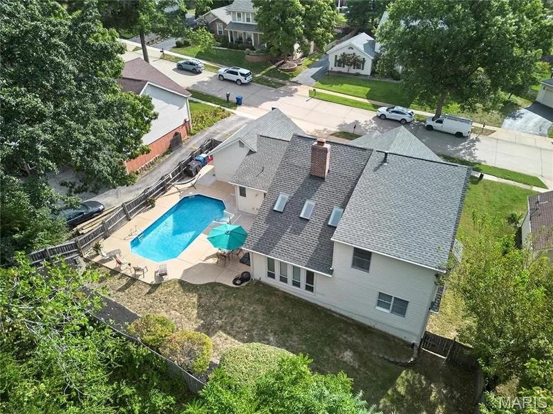 In-ground swimming pool with concrete surround — 1843 Shadywood Court, Chesterfield, MO 63017