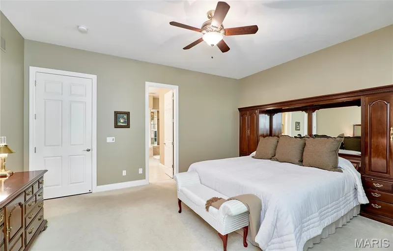 Recessed lighting, ceiling fan with integrated light fixture, light-toned carpeting, and a six-panel interior door — 1970 Chesterfield Ridge Circle, Chesterfield, MO 63017
