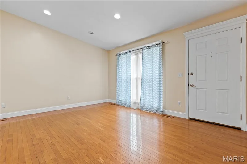 View from the hallway looking into the living room. — 1353 Osage Meadows Drive, O'Fallon, MO 63366