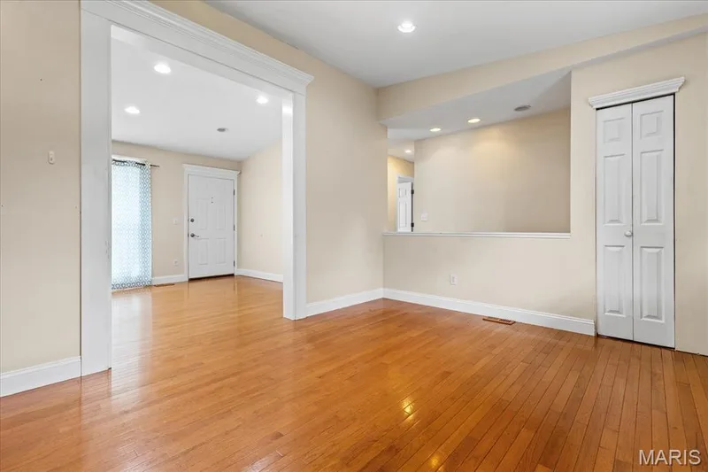 Half wall opens look over the stairs. — 1353 Osage Meadows Drive, O'Fallon, MO 63366