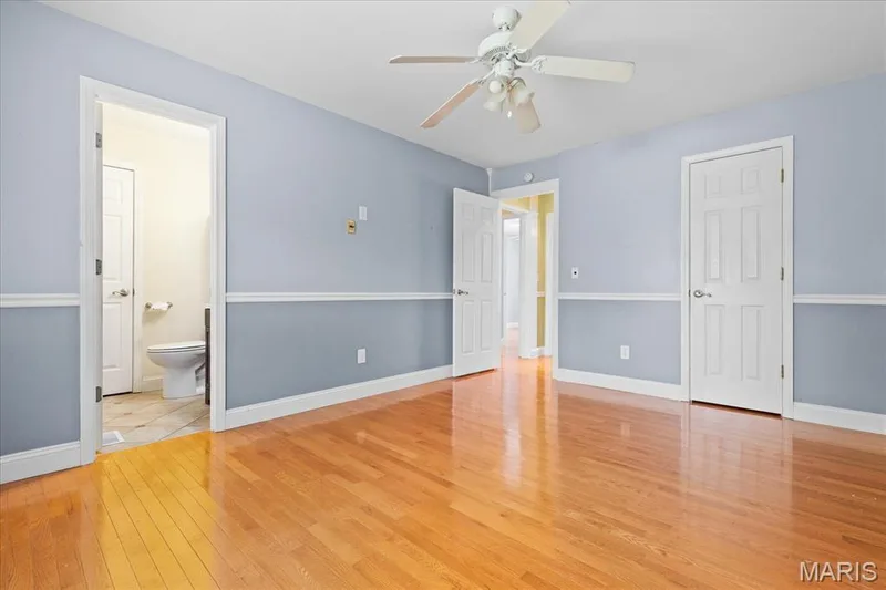 Primary bedroom with  1/2 bath — 1353 Osage Meadows Drive, O'Fallon, MO 63366