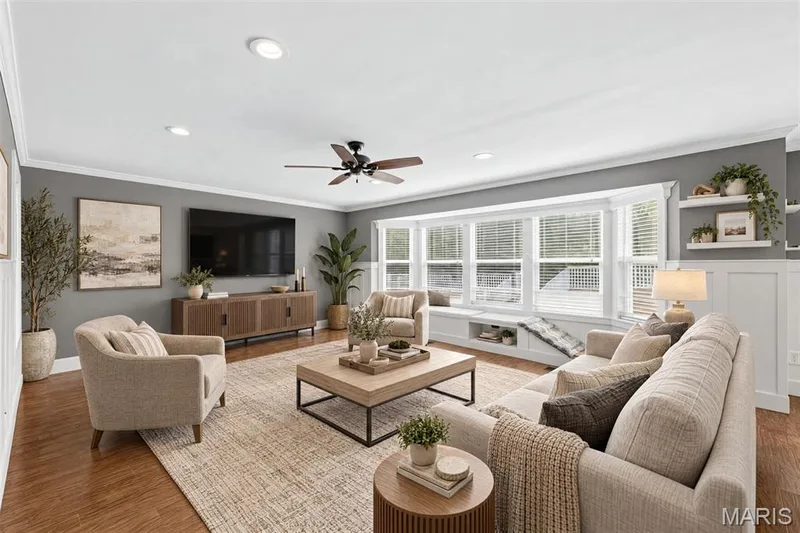 Recessed lighting, crown molding, a ceiling fan,  and a built-in window bench with storage — 242 Ashford Oaks Drive, Wentzville, MO 63385