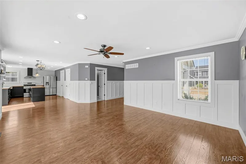 Wainscoting throughout the main level — 242 Ashford Oaks Drive, Wentzville, MO 63385