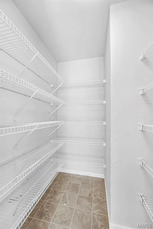 Walk in pantry with open shelving — 242 Ashford Oaks Drive, Wentzville, MO 63385