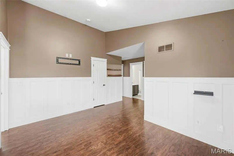 Upstairs open loft with wainscoting — 242 Ashford Oaks Drive, Wentzville, MO 63385