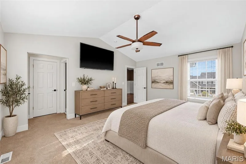 Vaulted ceiling in your primary bedroom — 242 Ashford Oaks Drive, Wentzville, MO 63385