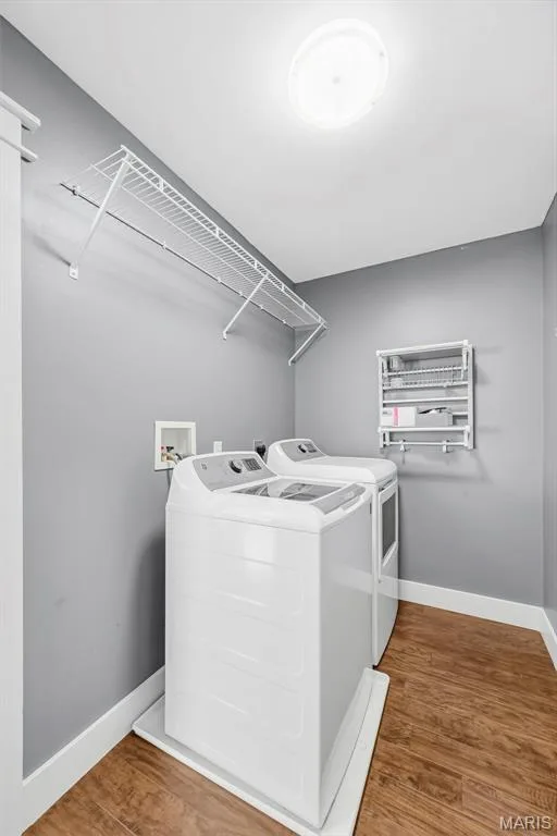 Laundry room off of kitchen and garage — 242 Ashford Oaks Drive, Wentzville, MO 63385