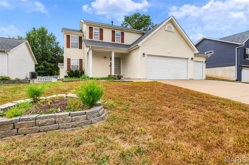 Front yard landscape — 242 Ashford Oaks Drive, Wentzville, MO 63385
