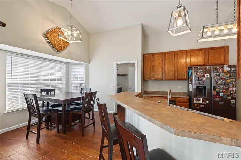 Vaulted ceilings with pendant lighting — 521 Sceptre Road, Wentzville, MO 63385