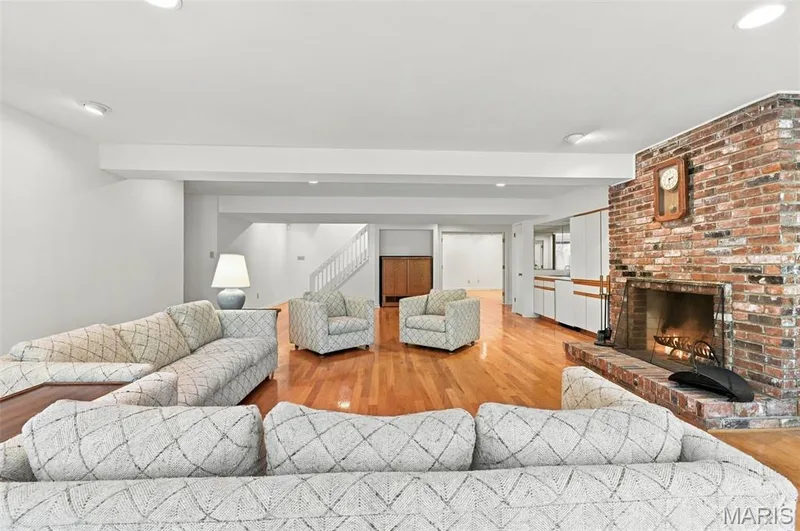 Full masonry fireplace, Lots of light for a lower level — 14033 Baywood Villages Drive, Chesterfield, MO 63017