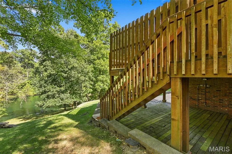 Upper deck access to lower level patio and deck and yard — 14033 Baywood Villages Drive, Chesterfield, MO 63017