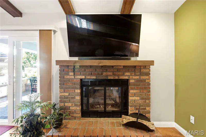 Wood burning fireplace that already has gas hook up if you want to convert — 733 Cedar Glen Drive, Weldon Spring, MO 63304