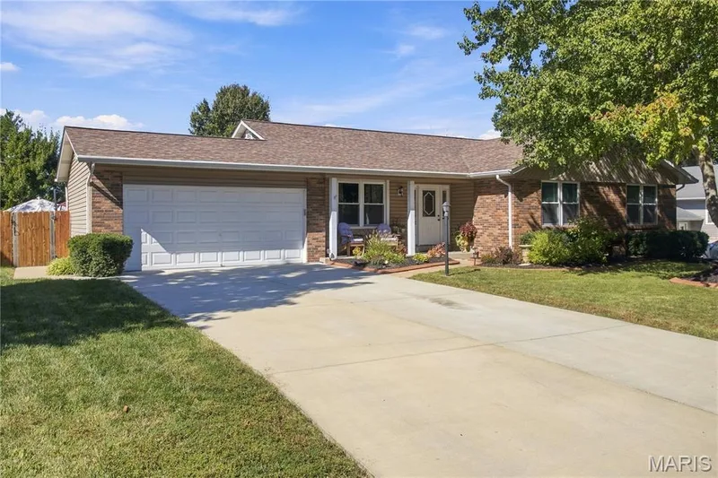 2 car garage and long driveway for more parking, great for your camper or boat — 733 Cedar Glen Drive, Weldon Spring, MO 63304